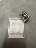 Ganz away in a manger charms